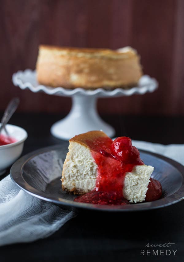 New York Style Cheesecake with Strawberry + Raspberry Sauce | Recipe from Sweet-Remedy.com