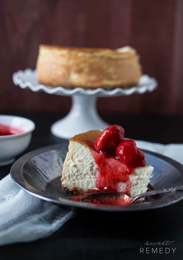 New York Style Cheesecake with Strawberry + Raspberry Sauce | Recipe from Sweet-Remedy.com
