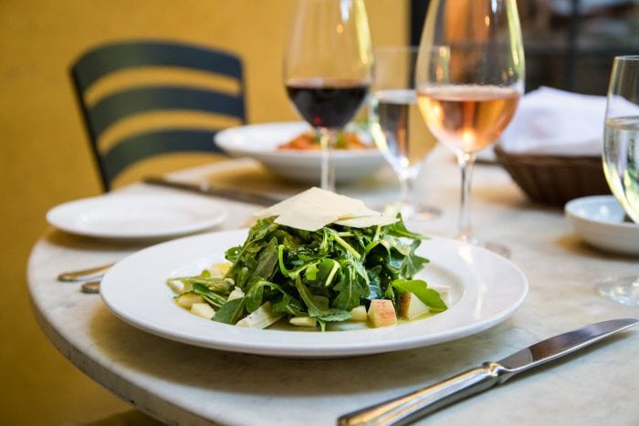 apple salad with glass of wine